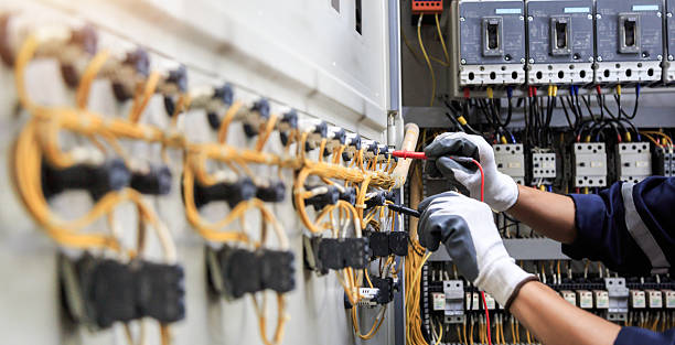 Professional Electrician technician working in Comstock Northwest, MI